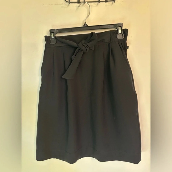 Lululemon Womens Black Self Tie High Waisted Skirt‎ Elastic Waist Pockets size 6 - Picture 1 of 7